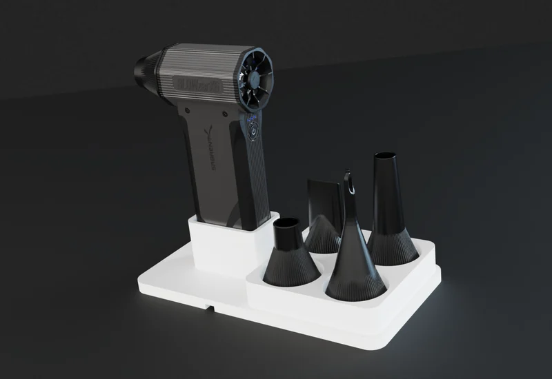 BLOWZER X6 in the desk dock with its four spare nozzles