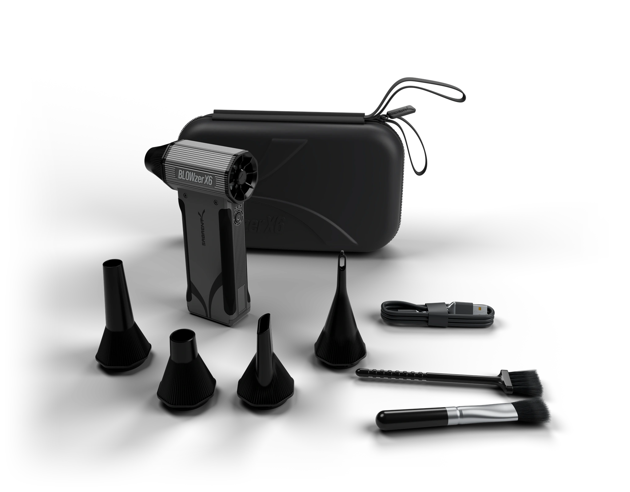Standing BLOWZER X6 with closed carrying case, interchangeable nozzles, cleaning brushes and USB cable